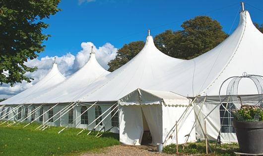 high-quality portable toilets stationed at a wedding, meeting the needs of guests throughout the outdoor reception in Bradford, RI